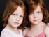 Portrait of Beautiful Twin Sisters