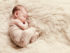 Newborn sleeping baby sleeps in Cambridge photography studio