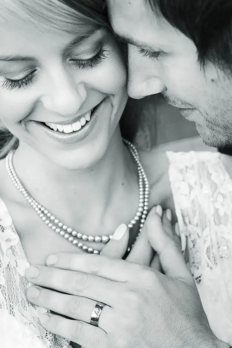 Close-up documentary wedding photography in Cambridgeshire showing a bride and groom sharing an emotional moment.